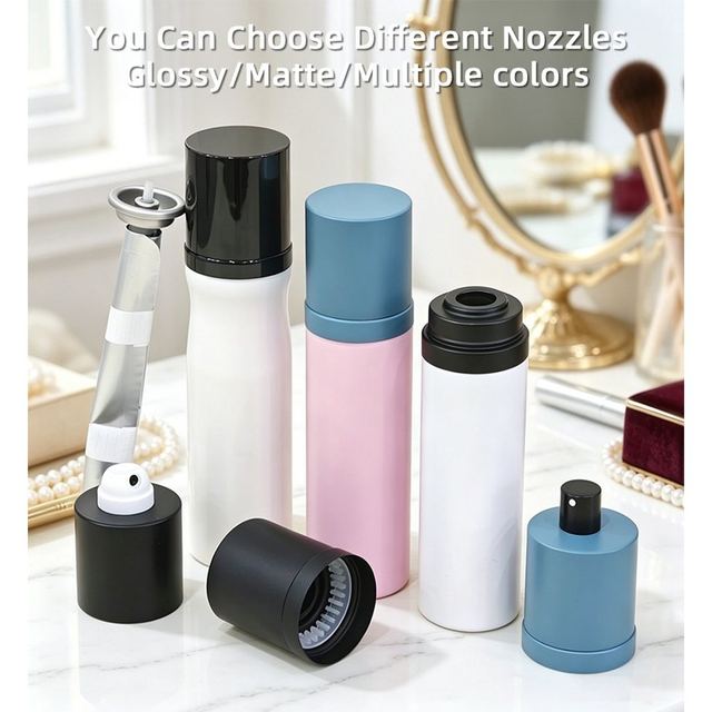 Perfume spray cans in gloss black, matte blue, white and pink finishes with different nozzle and cap options, including an uncapped can and a loose nozzle in front